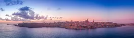 La Valletta sunrise with blue, orange, red, yellow sky in Malta  von tamas