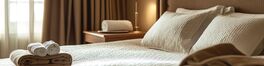Cozy hotel room with neatly made bed and soft lighting Von Alexandr